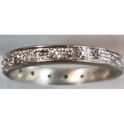 202 - White gold or platinum diamond full eternity ring. Unmarked.  2.21g approx. Size J1/2.  (B.P. 21% + ... 