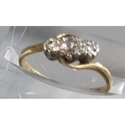 206 - 18ct gold and platinum twist shank three stone diamond ring.  1.8g approx.  Size I.  (B.P. 21% + VAT... 