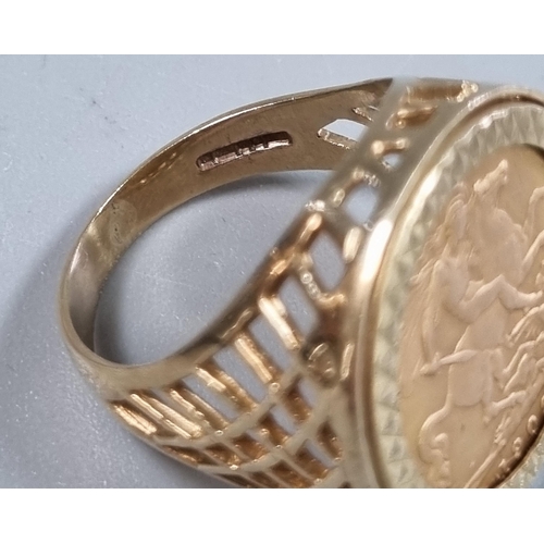 207 - 9ct gold pierced ring inset with a 1909 gold half sovereign.  8.1g approx.  Size Q.  (B.P. 21% + VAT... 