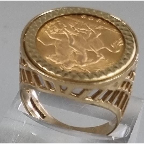 207 - 9ct gold pierced ring inset with a 1909 gold half sovereign.  8.1g approx.  Size Q.  (B.P. 21% + VAT... 