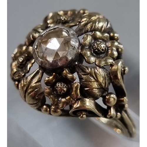 208 - 14ct gold Arts and Crafts style ring set with a rose cut diamond in ornate floral setting.  4.9g app... 