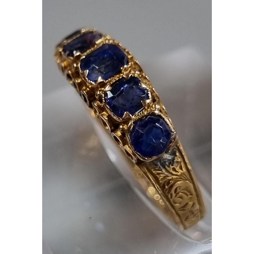 210 - 15ct gold Victorian ring set with five cornflower blue sapphires.  1.7g approx. Size L1/2.  In antiq... 