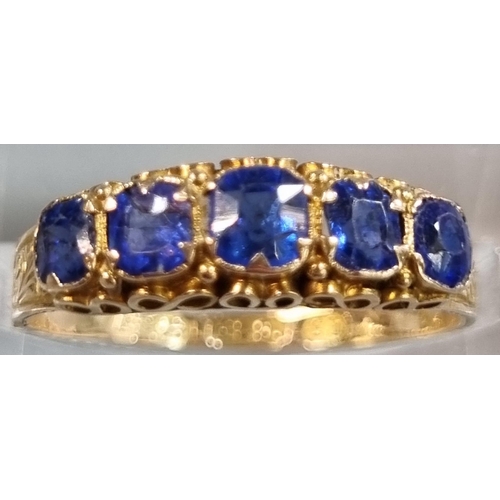 210 - 15ct gold Victorian ring set with five cornflower blue sapphires.  1.7g approx. Size L1/2.  In antiq... 