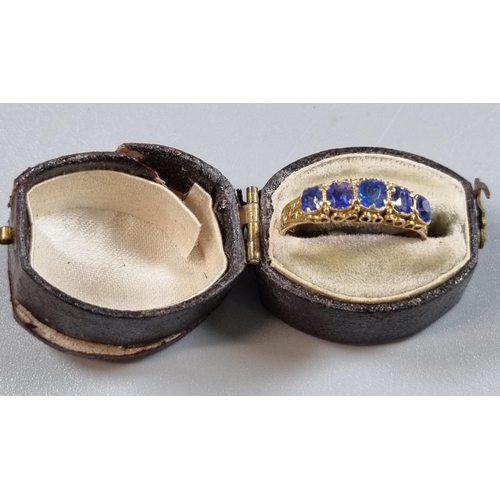 210 - 15ct gold Victorian ring set with five cornflower blue sapphires.  1.7g approx. Size L1/2.  In antiq... 