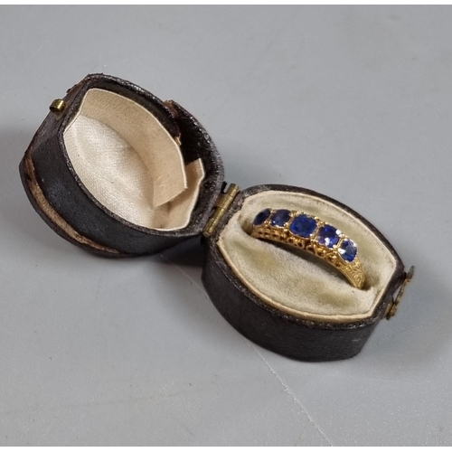 210 - 15ct gold Victorian ring set with five cornflower blue sapphires.  1.7g approx. Size L1/2.  In antiq... 