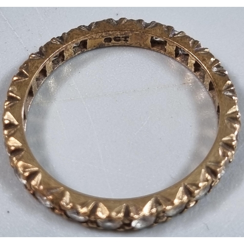 213 - 9ct gold full eternity style ring with white paste stones.  1.8g approx.  Size M1/2.  (B.P. 21% + VA... 