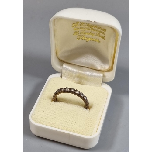 213 - 9ct gold full eternity style ring with white paste stones.  1.8g approx.  Size M1/2.  (B.P. 21% + VA... 