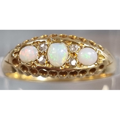 214 - Edwardian 18ct gold diamond and three stone Opal ring in fitted box.  2.8g approx.  Size O.  (B.P. 2... 