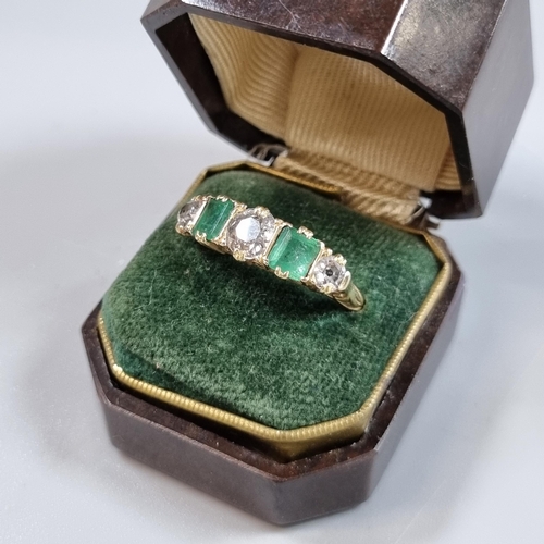 215 - Probably 18ct gold diamond and emerald five stone ring, set with old cut diamonds, the centre stone ... 