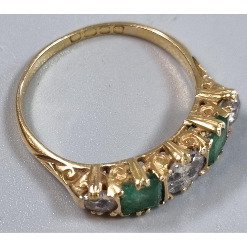 215 - Probably 18ct gold diamond and emerald five stone ring, set with old cut diamonds, the centre stone ... 