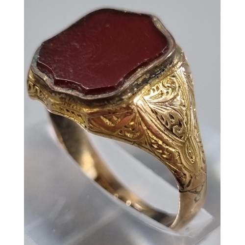 216 - 9ct gold shield shaped carnelian seal ring.  4.7g approx.  size Q1/2.  (B.P. 21% + VAT)