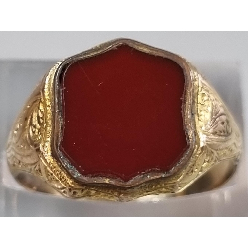 216 - 9ct gold shield shaped carnelian seal ring.  4.7g approx.  size Q1/2.  (B.P. 21% + VAT)