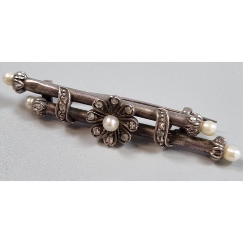 219 - 19th century ornate brooch set with pearls and small rose cut diamonds together with a moonstone nec... 