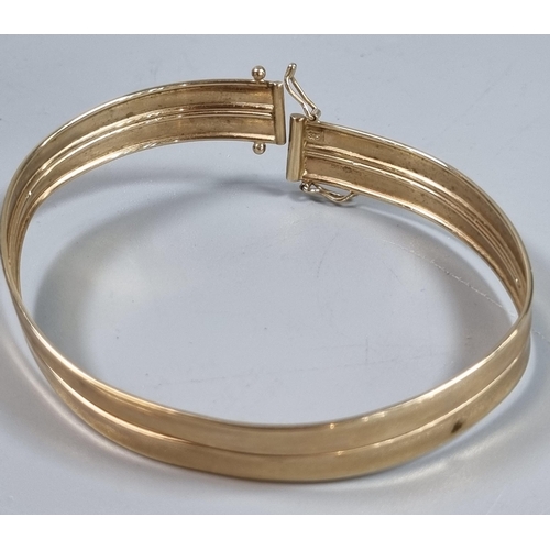 230 - 9ct gold bangle.  6.8g approx.  (B.P. 21% + VAT)