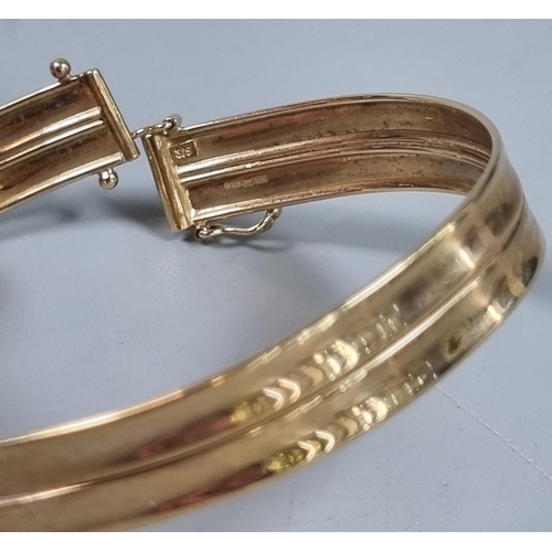 230 - 9ct gold bangle.  6.8g approx.  (B.P. 21% + VAT)