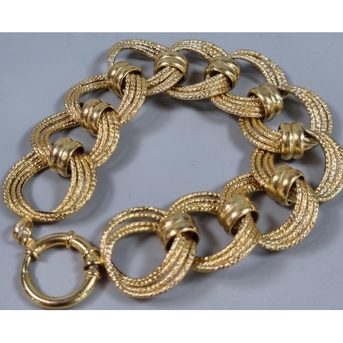 234 - 9ct gold contemporary weave and hoop design bracelet. 11.5g approx. 18cm long approx.  (B.P. 21% + V... 