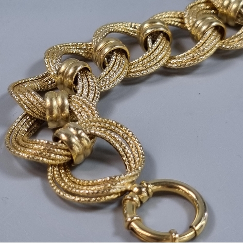 234 - 9ct gold contemporary weave and hoop design bracelet. 11.5g approx. 18cm long approx.  (B.P. 21% + V... 