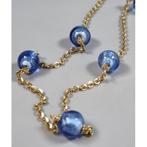 240 - 9ct gold chain with blue glass beads.  13.3g approx.  (B.P. 21% + VAT)