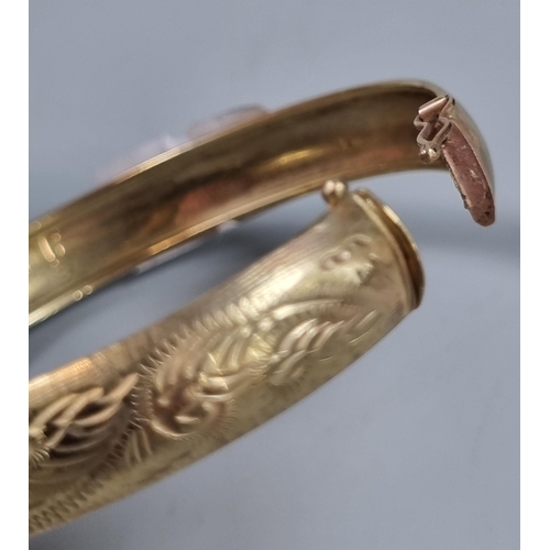 243 - 9ct gold engraved bangle.  7.8g approx.  (B.P. 21% + VAT)