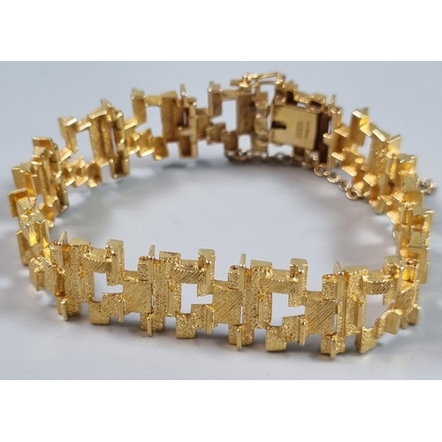 244 - 9ct gold modernist design bracelet.  24.5g approx.  (B.P. 21% + VAT)