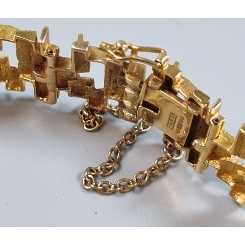 244 - 9ct gold modernist design bracelet.  24.5g approx.  (B.P. 21% + VAT)