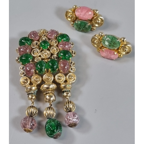 246 - Christian Dior, gilt metal brooch with green and pink coloured stones and a pair of matching clip on... 