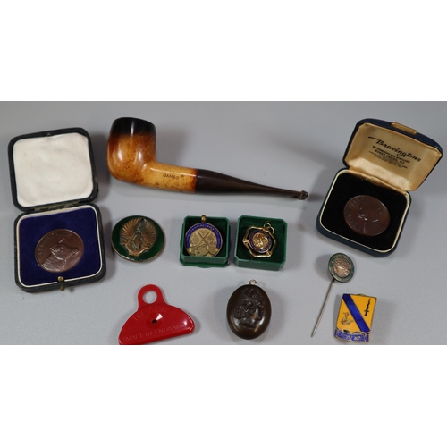 267 - Plastic tub comprising Whitby Jet carved locket, ACME Shepherds Lip Whistle, Milk Drink for Health M... 