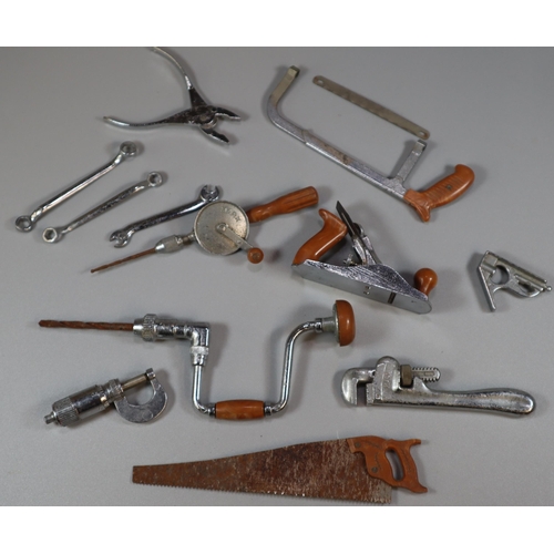 271 - Collection of twelve vintage 1960s Mars miniature hand tools to include: wood plane, hand saw, combi... 