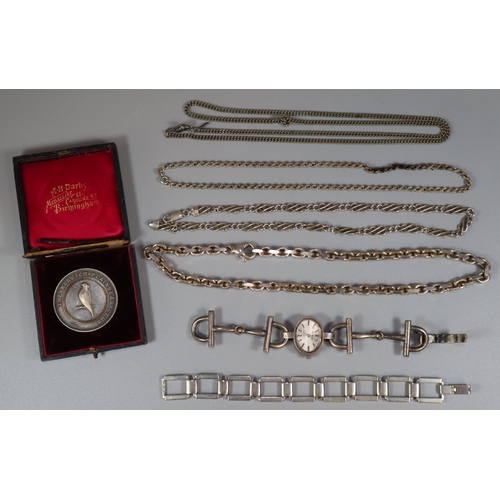 272 - Collection of silver items to include: Karim ladies watch, chains, bracelets, The Norwich Plainhead ... 