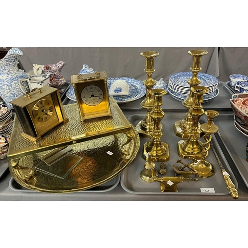 311 - Quantity of assorted brassware to include: two pairs of brass baluster shaped candlesticks, a single... 