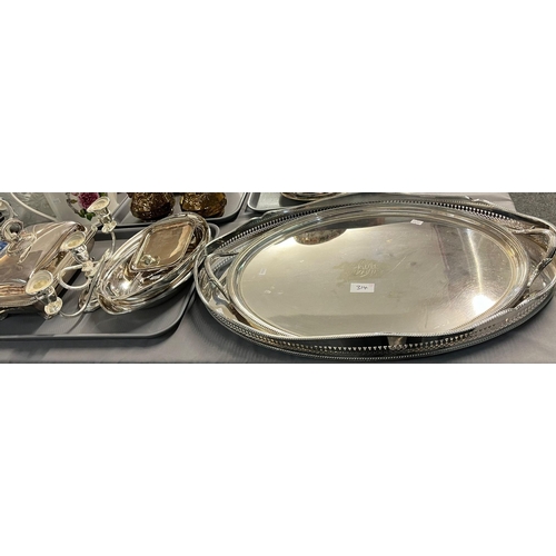 314 - Quantity of silver plated items to include: two oval salvers, entre dishes, candelabrum etc.  (2)   ... 