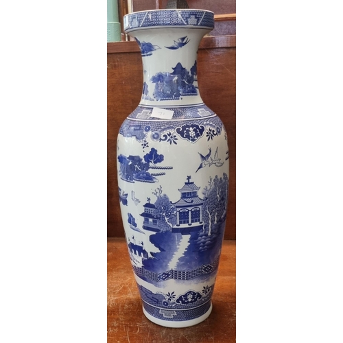 71 - Modern ceramic Oriental design blue and white floor vase.  62cm high approx.  (B.P. 21% + VAT)