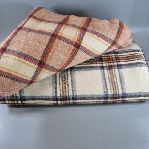 143 - Two multi-coloured Welsh checked blankets.  (2)   (B.P. 21% + VAT)