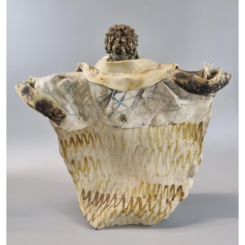 107 - Modern Art Pottery sculpture of a figure with outstretched arms and cape.   (B.P. 21% + VAT)