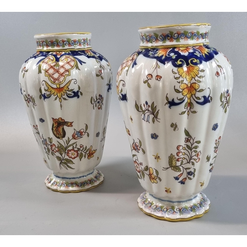 14 - Pair of Italian Faience vases of ribbed design with flowers and foliage.  20.5cm high approx.   (B.P... 