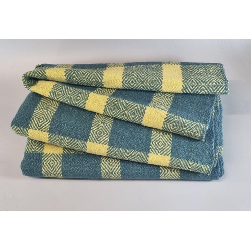 143 - Blue and yellow complex weave blanket.   (B.P. 21% + VAT)