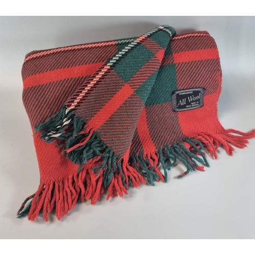 144 - Welsh red and green checked geometric blanket.   (B.P. 21% + VAT)