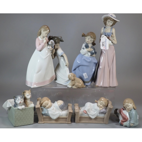 145 - Collection of eight Nao Spanish porcelain figurines, mainly of young children with puppies and cats.... 