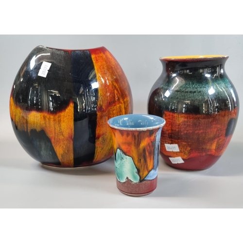 2 - Two modern Poole Pottery 'Gemstones' vases to include: small classic vase and purse vase.  The talle... 