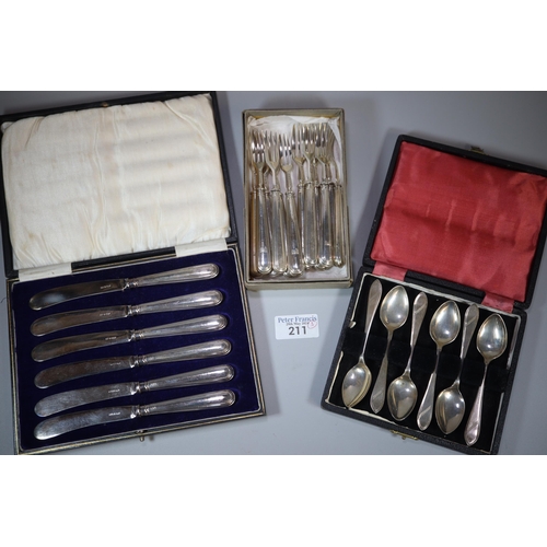 211 - Cased set of six silver spoons.  2.9 troy oz approx.  Together with set of six butter knives with si... 