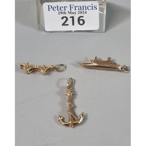 216 - 10ct gold charm, 'Pacific Princess' (3.7g approx.), together with a yellow metal anchor pendant (1.9... 