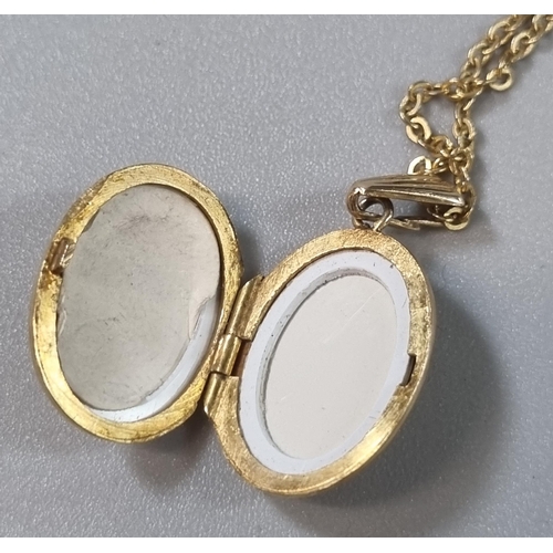 222 - 9ct gold engraved locket on a yellow metal fine link chain. Total weight 3.9g approx. (B.P. 21% + VA... 