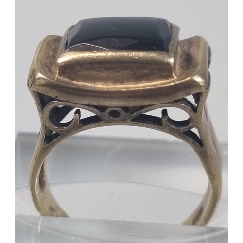 241 - 9ct gold and black onyx signet type ring. 4.6g approx. Size L 1/2 (B.P. 21% + VAT)