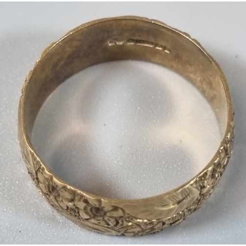 245 - 9ct gold engraved wedding band. 4.7g approx. Ring size T (B.P. 21% + VAT)