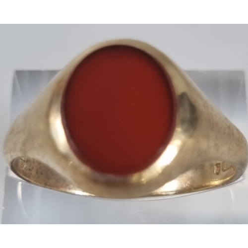 250 - 9ct gold hard stone signet ring. 4.3g approx. Size W (B.P. 21% + VAT)