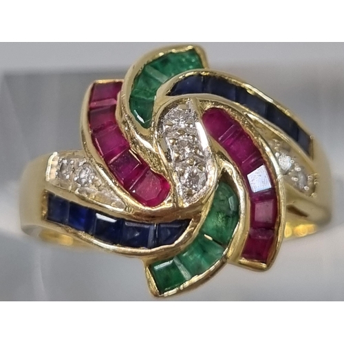 251 - 18ct gold modernist design ruby, sapphire, emerald and diamond ring, marked 750.  5.2g approx.  Size... 