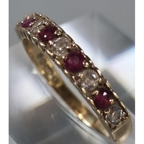 252 - 9ct gold nine stone ring. 1.6g approx. Ring size L (B.P. 21% + VAT)