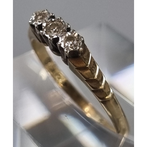 253 - 9ct gold diamond three stone ring. 1.3g approx. Ring size M (B.P. 21% + VAT)