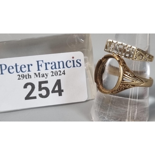 254 - Two 9ct gold rings, one marked 'Sister', the other missing its central stone. Total weight 5.1g appr... 