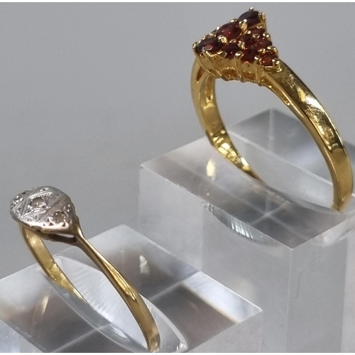 255 - 9ct gold three stone dress ring. 1.9g approx., together with a modern dress ring (B.P. 21% + VAT)